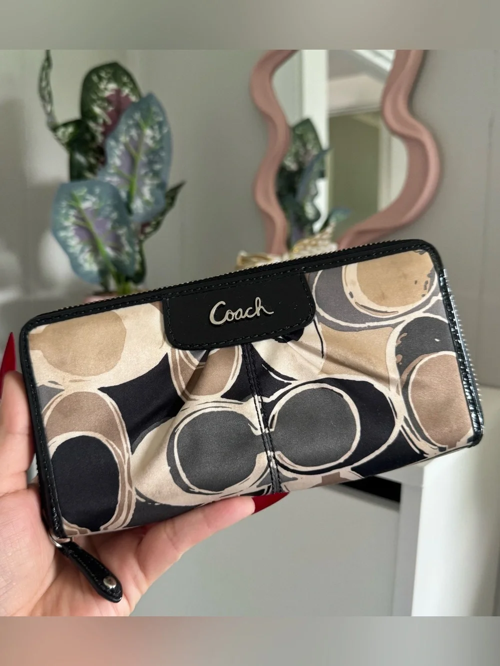 Coach Black and Tan Patterned Zip Wallet with Logo Plaque